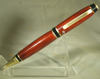 cigar pen in hand turned Redheart wood