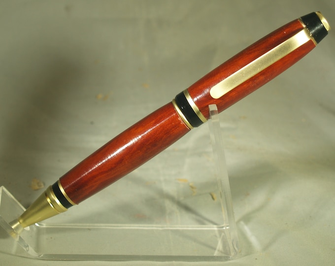 cigar pen in hand turned Redheart wood