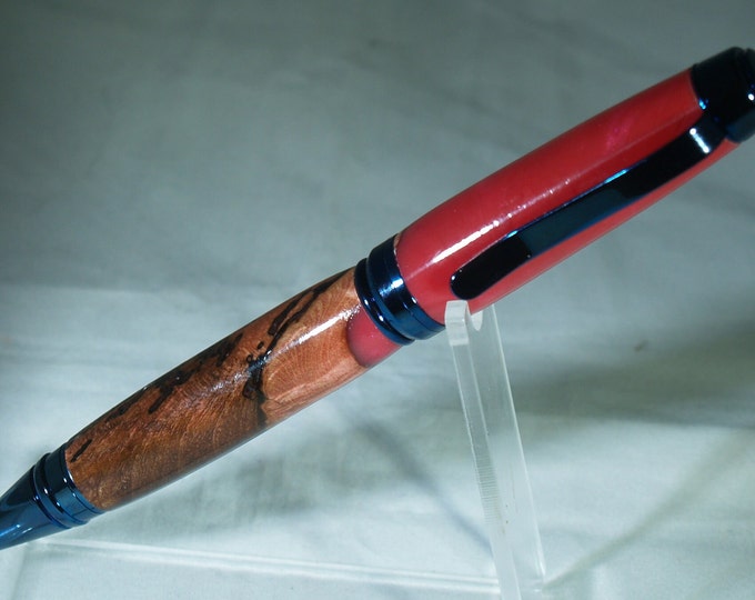 galaxy blue twist pen dressed in mable burl and alumilite resin