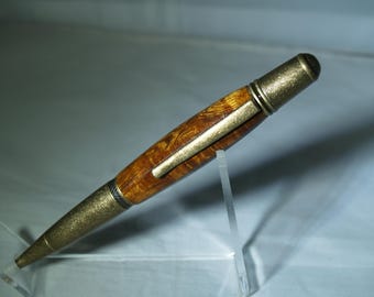 Antique Brass twist pen dressed in desert ironwood