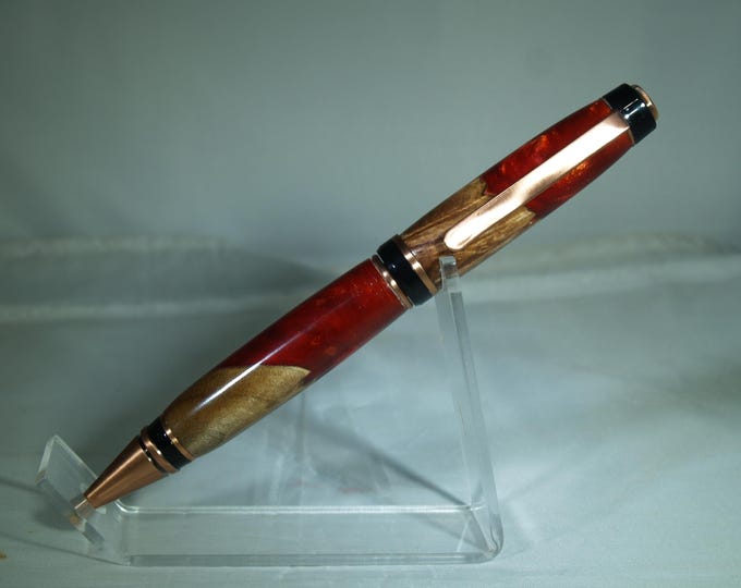 Antique copper pen dressed in maple burl and alumilite resin