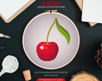 May include: Cross stitch pattern of a red cherry with a green stem and leaf. The pattern is 120 stitches wide and 120 stitches tall and uses 18 DMC colours.