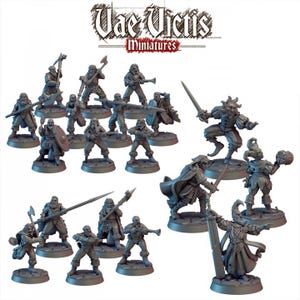 May include: A set of 15 unpainted miniature figures in various poses, some holding weapons, others with shields. The figures are made of grey plastic and are ready to be painted. Vae Victis Miniatures is printed on the top of the image.