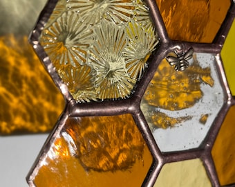 Stained glass honeycomb suncatcher with Tibetan Bee charm