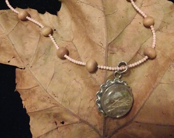 Round Rutilated Quartz pendant, pink Coral and Sandalwood beaded necklace