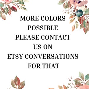 May include: A white sign featuring floral illustrations in the corners with pink roses, green leaves, and dark blue berries. The text reads: MORE COLORS POSSIBLE PLEASE CONTACT US ON ETSY CONVERSATIONS FOR THAT. The design is centered on a white background.