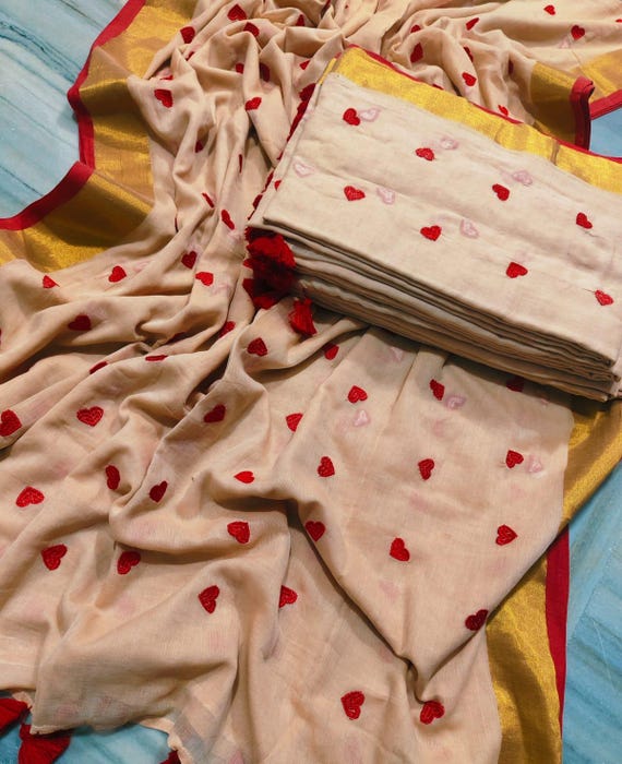 Mulmul cotton zari border embroidered saree with running blouse piece
