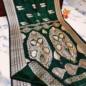 Munga  katan silk saree with floral weaving along with blouse piece