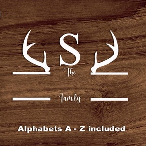 May include: White digital file design on a wood grain background. The design includes the letter "S" with antler accents, the words "The Family", and the text "Alphabets A - Z included". The file formats are listed on the right.