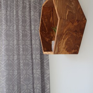 Hexagon wall shelf made of olive wood image 5