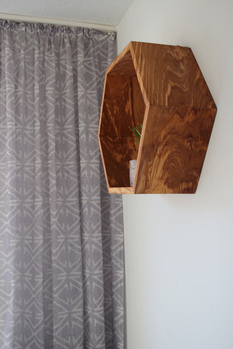 Hexagon wall shelf made of olive wood image 5