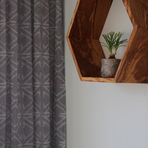 Hexagon wall shelf made of olive wood image 7