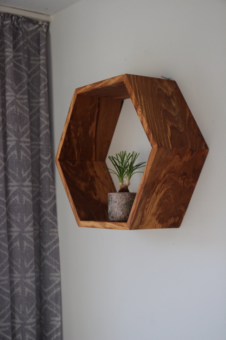 Hexagon wall shelf made of olive wood image 3