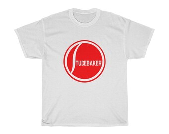 May include: White t-shirt featuring a red circular logo with the word "Studebaker" in white text.