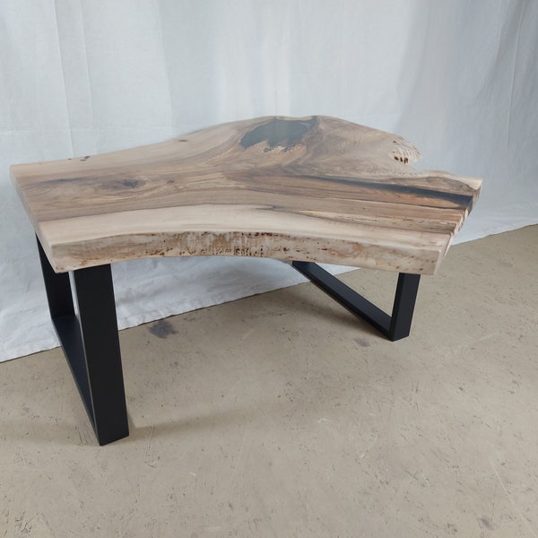 Artfully handmade coffee table made of walnut wood / epoxy resin black