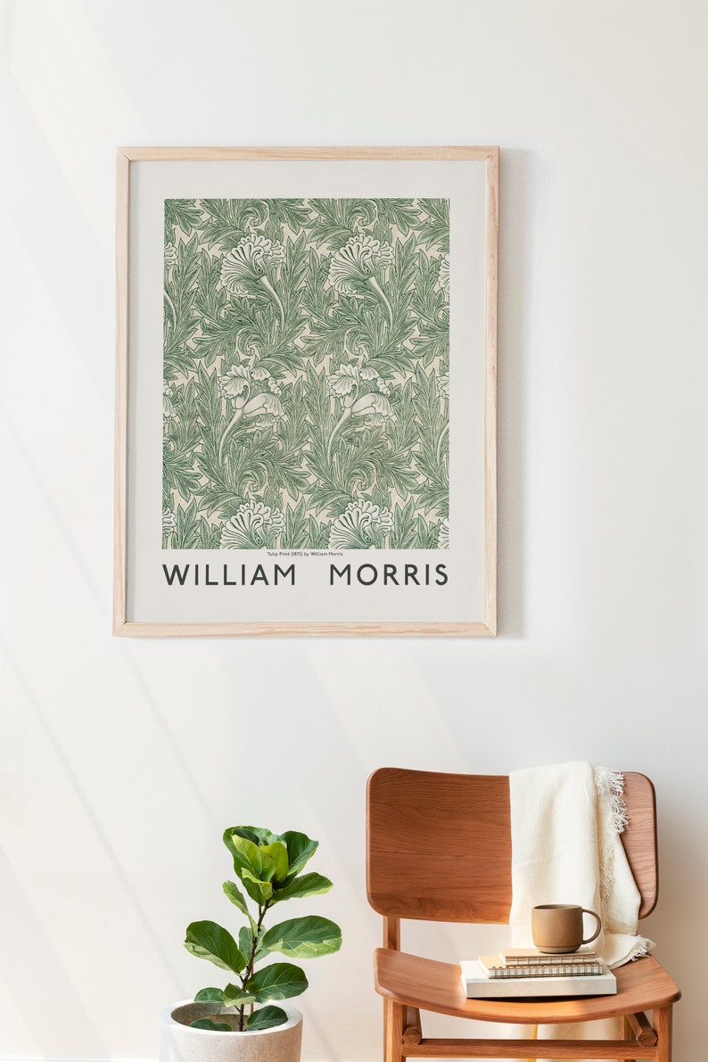 May include: A framed print of a green and white floral pattern with the text "Tulips Print (1876) by William Morris" and "WILLIAM MORRIS" below the pattern.