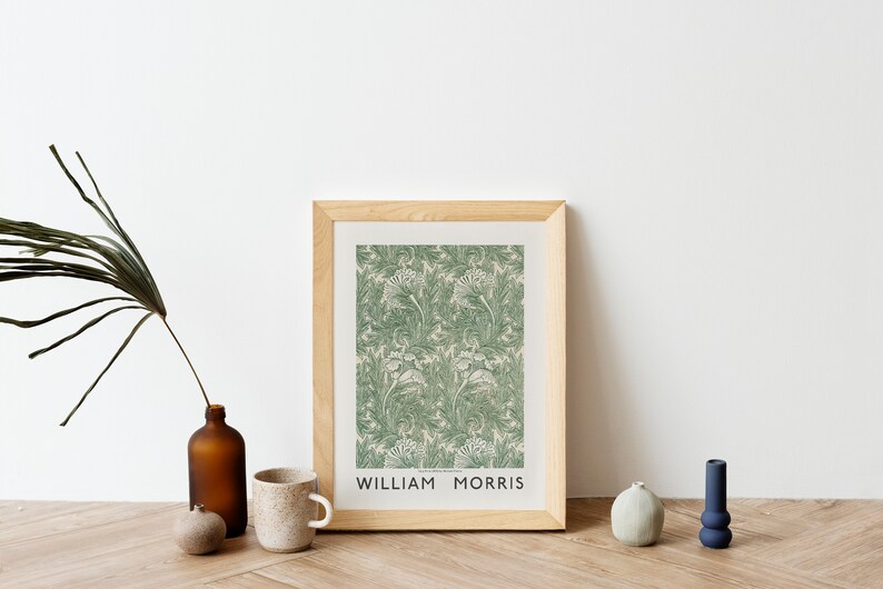 May include: A framed print with a green and white floral pattern. The print is titled "William Morris".