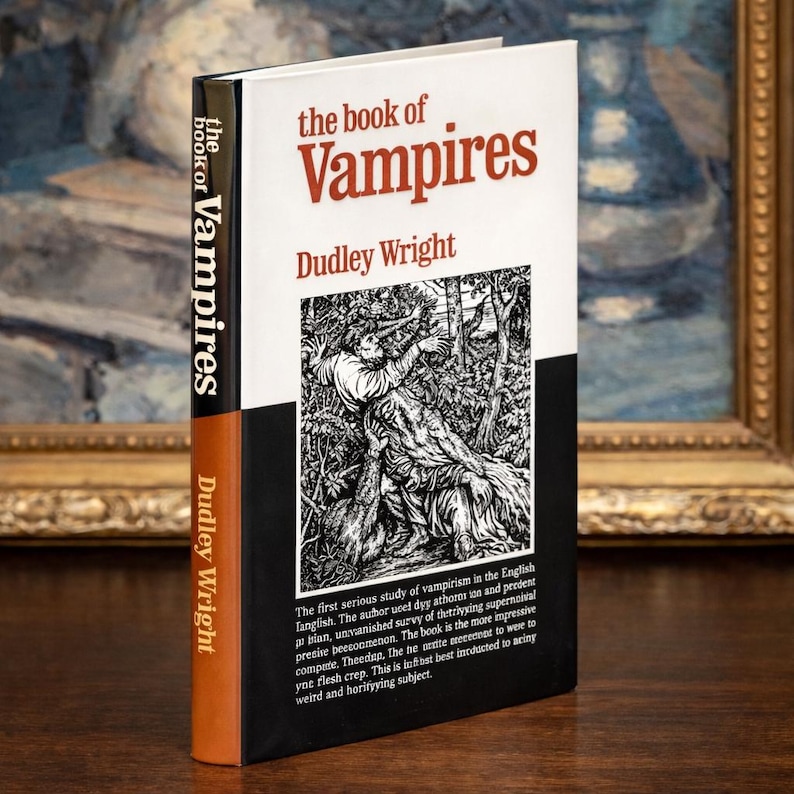 May include: A hardcover book titled "the book of Vampires" by Dudley Wright. The cover features a black and white illustration of a person in a forest. The spine is orange with the author's name and title.