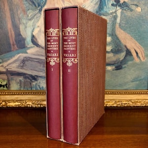 Obra de historia del arte en dos volúmenes de la serie "Vidas de pintores" de Vasari (edición antigua).