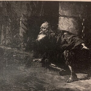 May include: A detailed black and white illustration depicts an elderly man with a long beard, chained in a dark, stone-walled environment. The man is kneeling, with a chain around his ankle. A small rat is visible.
