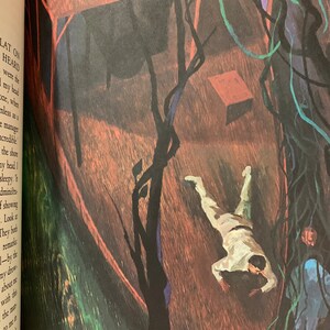 Illustration from Heart of Darkness by Joseph Conrad – Easton Press 1980 edition. A dark-toned painting of a man lying face-down in a boat, surrounded by dense jungle colors. Powerful visual representation of colonial despair and isolation.