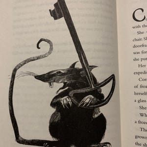 May include: A black and white ink illustration of a rat standing on its hind legs. The rat has a long, curved tail and is holding a large, ornate skeleton key with both front paws. The rat has visible whiskers and sharp teeth.
