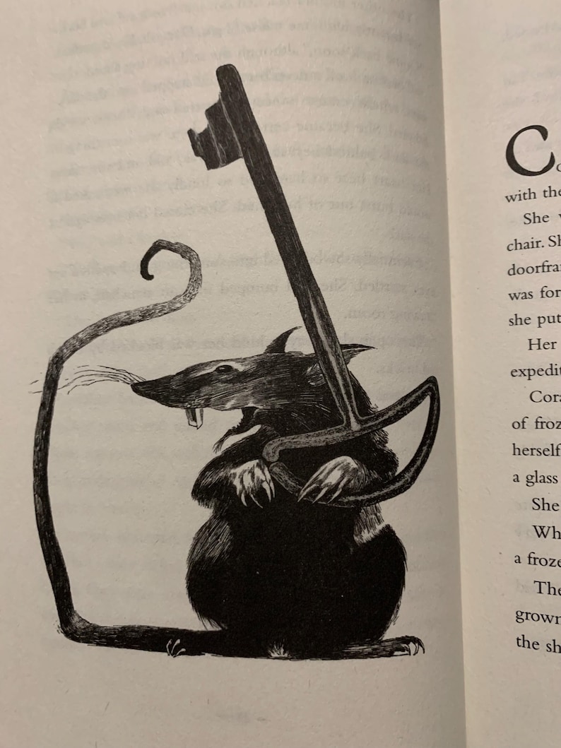 May include: A black and white ink illustration of a rat standing on its hind legs. The rat has a long, curved tail and is holding a large, ornate skeleton key with both front paws. The rat has visible whiskers and sharp teeth.