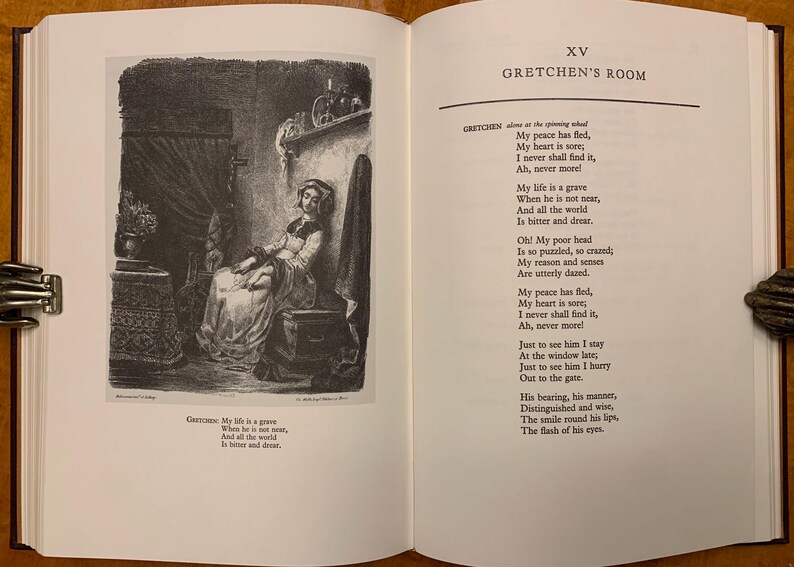 May include: A black and white illustration of a woman sitting in a chair. The woman is looking down and appears to be sad. The text in the image reads "My life is a grave When he is not near, And all the world Is bitter and drear."