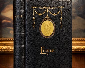 Lucile, de Owen Meredith (década de 1890) – Livro de poesia antigo encadernado em couro com medalhão de celuloide.