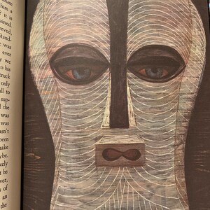 Black and white illustration from Heart of Darkness – Easton Press 1980 edition. Features a tribal mask or symbolic artwork tied to the novel’s themes of colonialism and darkness. A richly illustrated collector’s edition for literary enthusiasts.