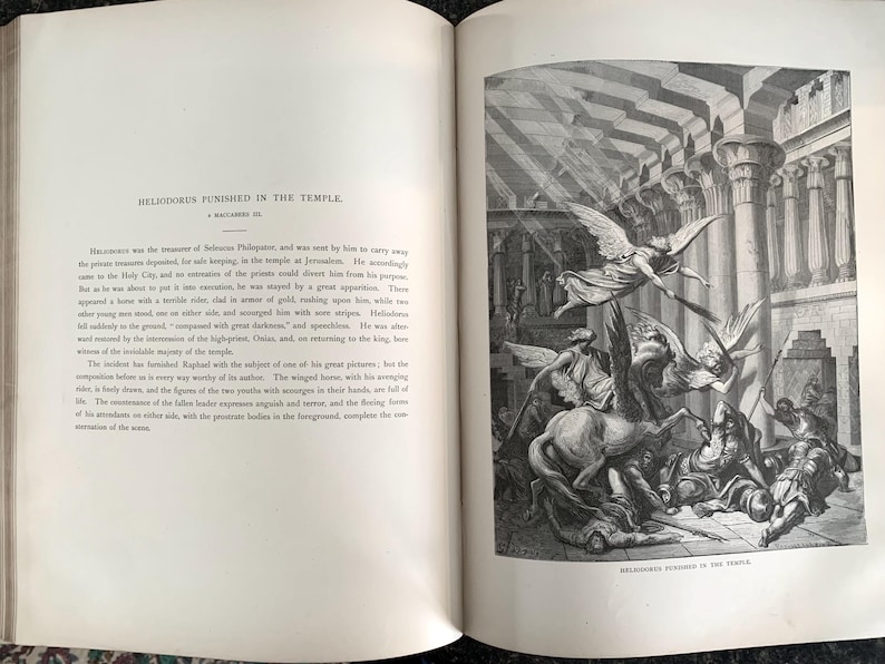 May include: A black and white illustration depicting a scene from the Bible story of Heliodorus being punished in the Temple.  The illustration shows a winged angel striking Heliodorus with a whip, while other angels surround him.  The text "HELIODORUS PUNISHED IN THE TEMPLE" is printed below the illustration.