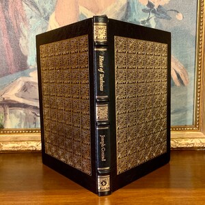 Heart of Darkness by Joseph Conrad – 1980 Easton Press leather-bound collector’s edition. Features black leather cover with gold gilt spine and raised bands. A luxurious vintage classic for fans of fine literature and collectible Easton Press books.