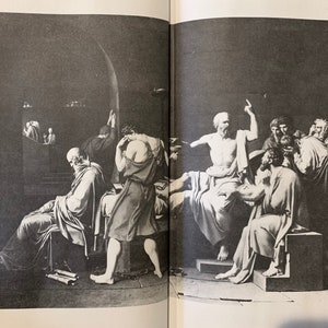 May include: A black and white photograph of a painting depicting a scene from a courtroom. A man in the center of the image is gesturing with his right hand, while other figures are seated around him. The painting is titled "The Death of Socrates" by Jacques-Louis David.