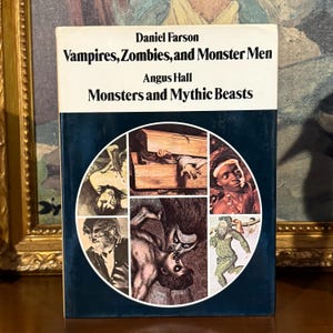 May include: A hardcover book titled "Vampires, Zombies, and Monster Men" by Daniel Farson and Angus Hall. The cover features a blue and white design with a circular collage of monster illustrations. The book is about monsters and mythic beasts.