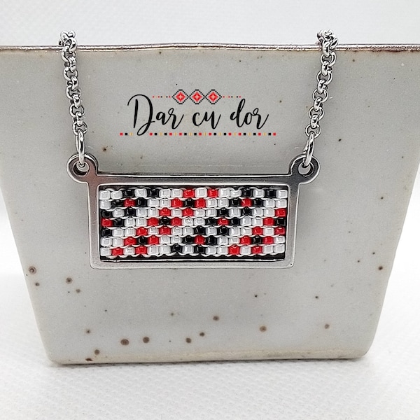 Stainless steel necklace with rectangle pendant having beaded traditional motif inserted, geometrical fine detail, romanian motif