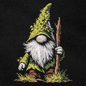 May include: Embroidered gnome with a long white beard, wearing a green and yellow hat and jacket, holding a wooden staff. The gnome stands in grass against a black background. The design is detailed and whimsical.
