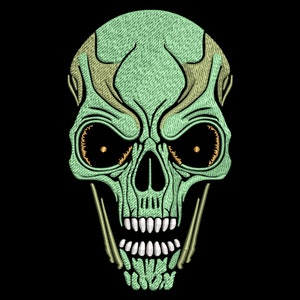 May include: Green skull with yellow eyes and a toothy grin. The skull is embroidered with a detailed design.