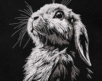 Puede incluir: Una imagen bordada en blanco y negro de un conejo mirando hacia arriba con las orejas levantadas.