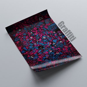 May include: A sheet of paper with a colorful graffiti design. The artwork features a dense pattern of cartoonish figures in shades of pink, blue, and black. The word "Nerds" is visible within the design. The word "Graffiti" is printed on the side.