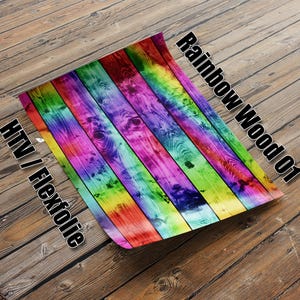 Puede incluir: Vinilo de transferencia térmica (HTV) o lámina de flex con textura de madera arcoíris. Se trata de una lámina de vinilo de colores con un patrón de madera. Se utiliza para manualidades y la creación de diseños personalizados en tela, ropa y otras superficies.