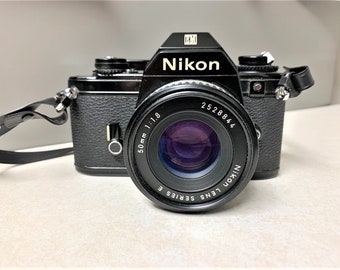 Nikon EM 35mm Film Camera Made in Japan with Extra Lens