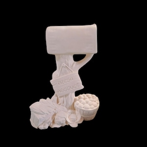 May include: A white ceramic sculpture of a tree with a sign that reads "FRESH PRODUCE". The sculpture includes a basket of produce, a bundle of vegetables, and a blank sign at the top, perfect for personalization.