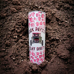 May include: White tumbler with a pink leopard print design. The tumbler has the text "Look Pretty Play Dirty" and a pink and black off-road vehicle graphic.