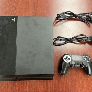 SALE] Sony PS4 Pro 1TB + 2x controllers and charger + 4 games