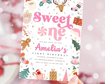 May include: A festive invitation with the text "Sweet One" in pink, surrounded by Christmas-themed illustrations. The invitation is for Amelia's first birthday, with details including the date, time, and location.