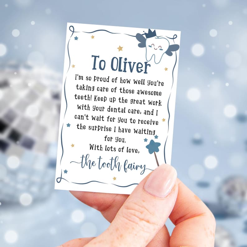 May include: A blue and white tooth fairy note with gold stars and the text "To Oliver I'm so proud of how well you're taking care of those awesome teeth! Keep up the great work with your dental care, and I can't wait for you to receive the surprise I have waiting for you. With lots of love, the tooth fairy"