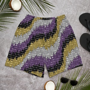 May include: Purple, gold and white patterned men's swimming trunks with a binary code design.