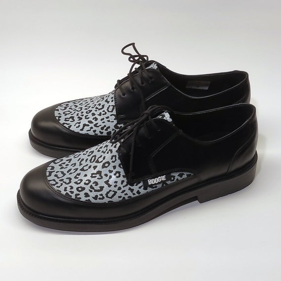 Zapatos elegantes con estampado negro y leopardo con cordones