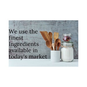 May include: A wooden countertop with a white ceramic jar filled with wooden spoons and spatulas. A glass jar with a white lid contains white powder. A smaller glass jar with a red lid contains dried flowers. The text "We use the finest ingredients available in today's market" is written in black on a grey background.