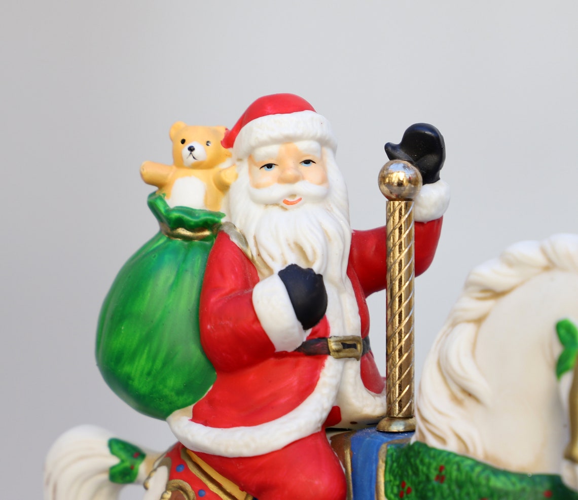 The San Francisco Music Box Company Santa Claus Christmas Carousel Ride